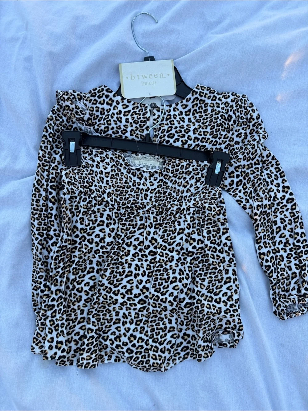 btween cute leopard